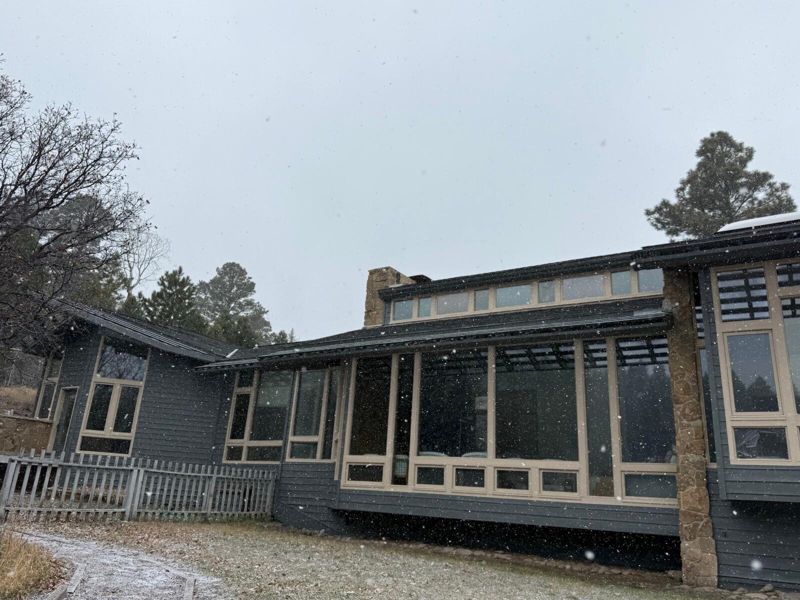 Completed dark mountain home exterior remodel
